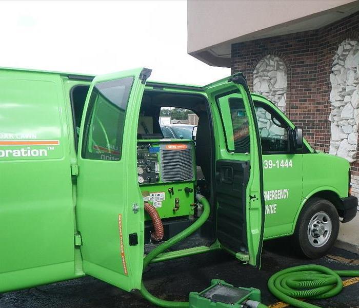 SERVPRO truck with water extraction equipment